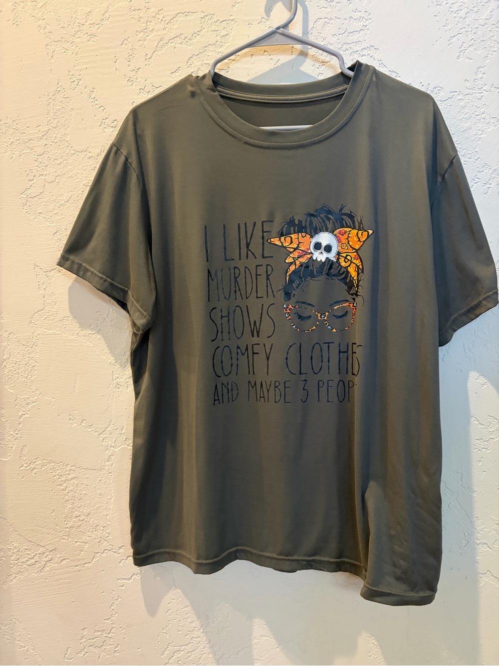 Olive Graphic Short Sleeve Tee “I like murder shows, comfy clothes, and…